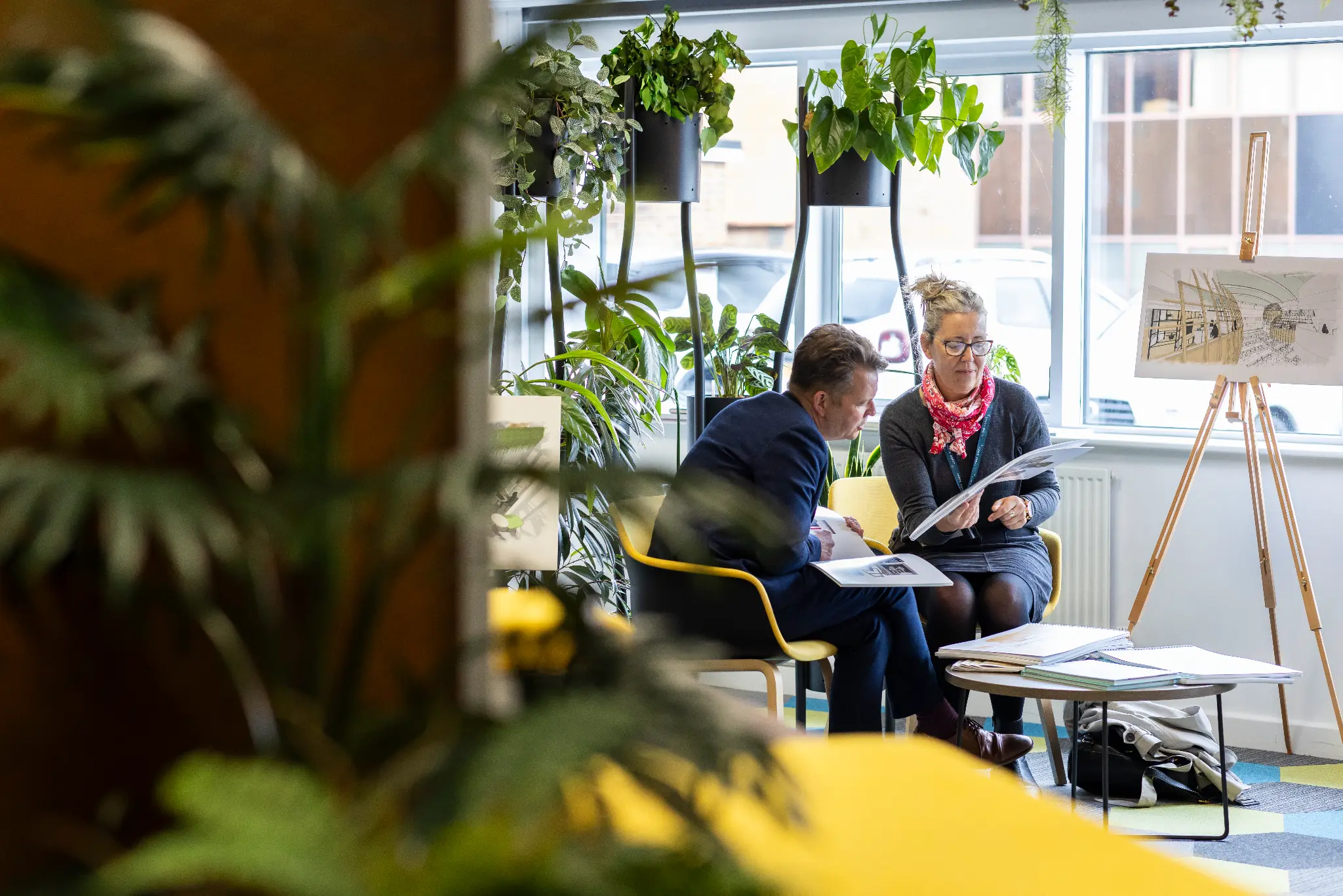 Team consultation in creative workspace